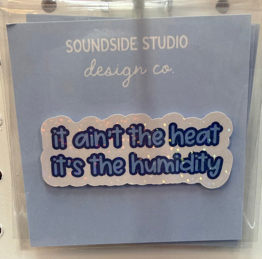 “It ain’t the heat it’s the humidity” holographic sticker